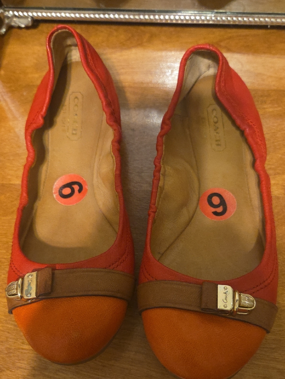 Coach Red Leather Ballet Flats with Brown Trim and Gold Hardware
